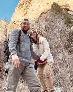 Parker Watts and his wife on a hike